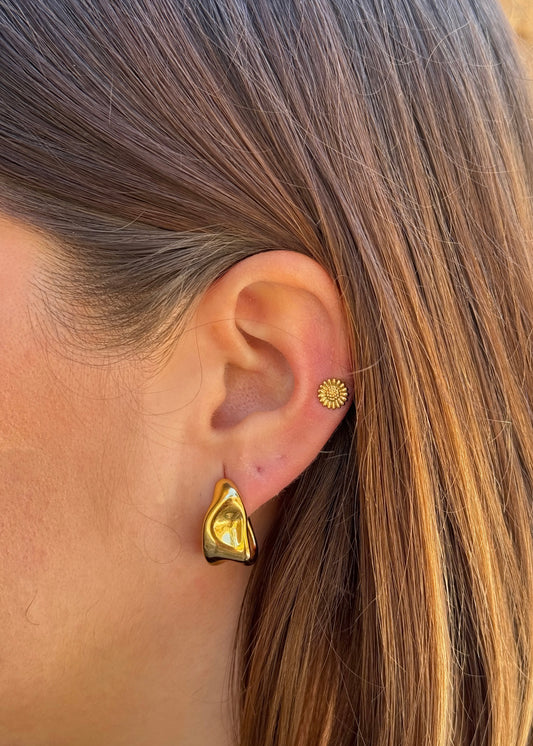 Piercing girasol
